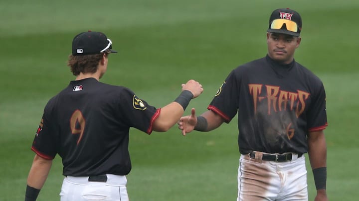 The Wisconsin Timber Rattlers’ Josh Adamczewski (9) and Braylon Payne (6) against the Peoria Chiefs during their baseball game at Neuroscience Group Field at Fox Cities Stadium in Grand Chute, Wis. on Wednesday, April 15, 2026 in Grand Chute, Wis. The Timber Rattlers defeated Peroria 7-4.
Wm. Glasheen USA TODAY NETWORK-Wisconsin