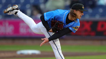 Former Akron RubberDucks pitcher Doug Nikhazy (29) follows through on a pitch during the first inning of an opening-day baseball game against the Altoona Curve at Canal Park, Friday, April 5, 2024, in Akron, Ohio.