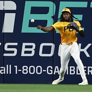 Jun 11, 2025; Pittsburgh, Pennsylvania, USA; Pittsburgh Pirates center fielder Oneil Cruz  plays the ball against the Texas Rangers at PNC Park. Mandatory Credit: Philip G. Pavely-Imagn Images