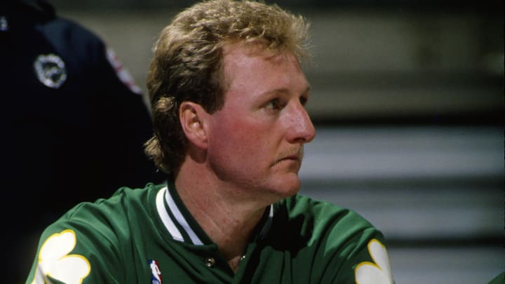 Jan 17, 1990; Orlando, FL, USA; FILE PHOTO; Boston Celtics forward Larry Bird (33) on the bench against the Orlando Magic at the Orlando Arena. Mandatory Credit: USA TODAY Sports