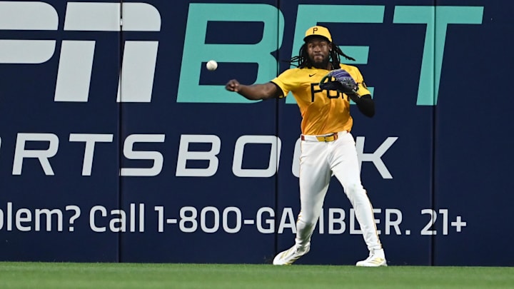 Jun 11, 2025; Pittsburgh, Pennsylvania, USA; Pittsburgh Pirates center fielder Oneil Cruz  plays the ball against the Texas Rangers at PNC Park. Mandatory Credit: Philip G. Pavely-Imagn Images