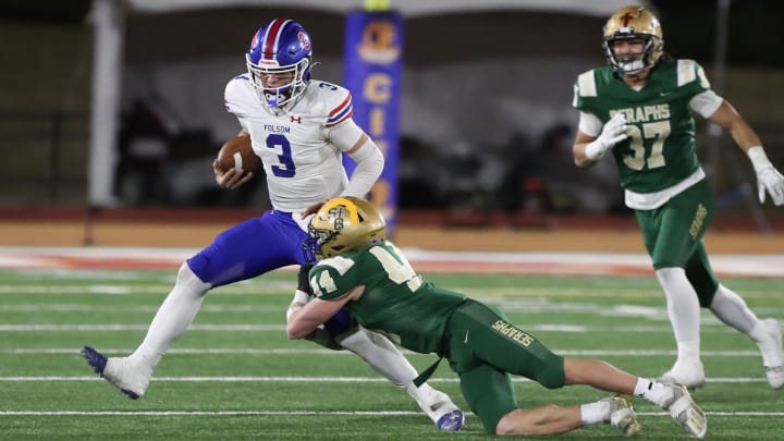 St. Bonaventure's Dylan Dunst tackles Folsom quarterback Ryder Lyons