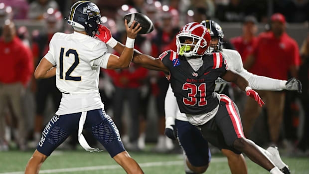 Mater Dei linebacker Nasir Wyatt gets in the face of St. John Bosco quarterback Koa Malau’ulu.