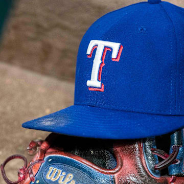 Jun 20, 2017; Arlington, TX, USA; A view of a Texas Rangers baseball hat and Wilson glove during the game between the Texas Rangers and the Toronto Blue Jays at Globe Life Park in Arlington.