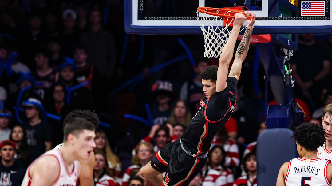 Nov 24, 2025; Tucson, Arizona, USA; Denver Pioneers forward Shaun Wysocki (1) dunks the ball during the second half of the game against the Arizona Wildcats at McKale Memorial Center. Mandatory Credit: Aryanna Frank-Imagn Images