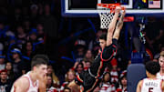 Nov 24, 2025; Tucson, Arizona, USA; Denver Pioneers forward Shaun Wysocki (1) dunks the ball during the second half of the game against the Arizona Wildcats at McKale Memorial Center. Mandatory Credit: Aryanna Frank-Imagn Images