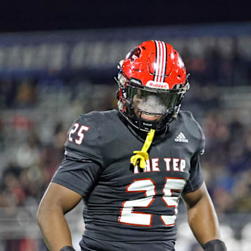 Imhotep Charter players celebrate during the 2023 PIAA Class 5A state championship game