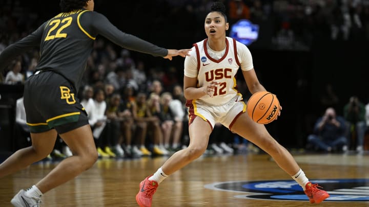 Mar 30, 2024; Portland, OR, USA; USC Trojans guard JuJu Watkins (12) steps back during the second half against Baylor Lady Bears guard Bella Fontleroy (22) in the semifinals of the Portland Regional of the 2024 NCAA Tournament at the Moda Center. Mandatory Credit: Troy Wayrynen-USA TODAY Sports