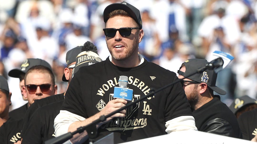 Dodgers first baseman Freddie Freeman speaks to the fans during the 2025 World Series championship celebration at Dodger Stadium in Los Angeles on Monday, Nov. 3, 2025.