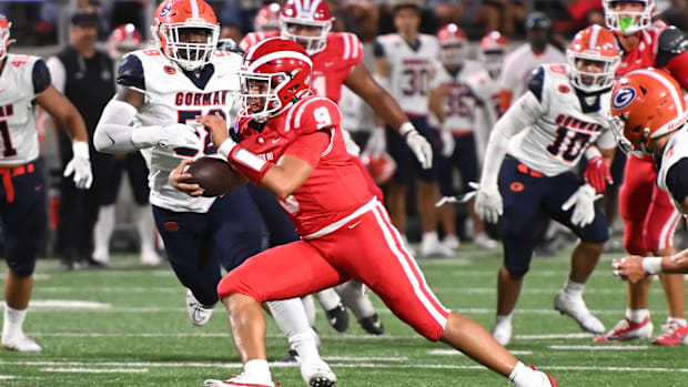 Mater Dei QB Ashton Beierly scrambles in the first half against Bishop Gorman on Friday, Sept. 6, 2024.