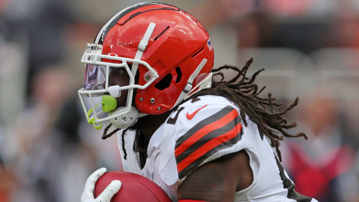 Cleveland Browns running back D'Onta Foreman (27) runs for yards during the first half of an NFL preseason football game at Cleveland Browns Stadium, Saturday, Aug. 17, 2024, in Cleveland, Ohio.