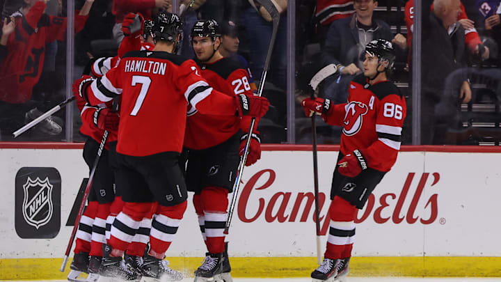 Oct 25, 2024; Newark, New Jersey, USA; The New Jersey Devils celebrate a goal by New Jersey Devils left wing Jesper Bratt (63) against the New York Islanders during the third period at Prudential Center. Mandatory Credit: Ed Mulholland-Imagn Images