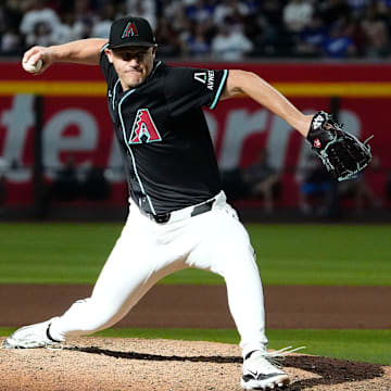 Arizona Diamondbacks pitcher Paul Sewald (38) throws to the Los Angeles Dodgers in the ninth inning at Chase Field on Sept. 2, 2024, in Phoenix.