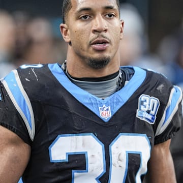 Dec 22, 2024; Charlotte, North Carolina, USA; Carolina Panthers running back Chuba Hubbard (30) after his game winning touchdown against the Arizona Cardinals during the second half at Bank of America Stadium. 
