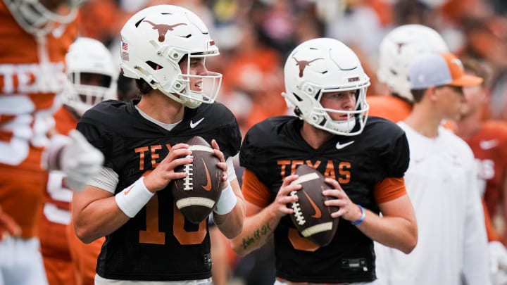 Texas Longhorns quarterbacks Arch Manning (16), left, and  Quinn Ewers (3) warm up ahead of the Longhorns' spring Orange and White game. Mandatory Credit: Sara Diggins-USA Today Sports via American Statesman