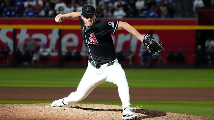 Arizona Diamondbacks pitcher Paul Sewald (38) throws to the Los Angeles Dodgers in the ninth inning at Chase Field on Sept. 2, 2024, in Phoenix.