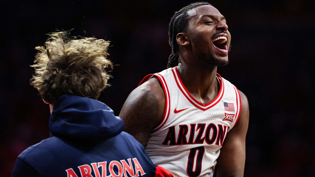Jan 14, 2026; Tucson, Arizona, USA; Arizona Wildcats guard Jaden Bradley (0) celebrates at the end of the game against the Arizona State Sun Devils at McKale Memorial Center. Mandatory Credit: Aryanna Frank-Imagn Images