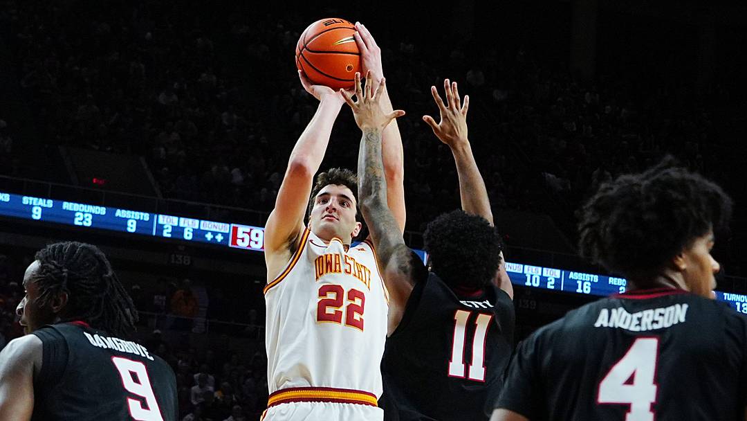 Iowa State Cyclones forward Milan Momcilovic (22) takes a three-point shot over Texas Tech Red Raiders guard Jaylen Petty (11) during the second half in the Big-12 conference men’s basketball showdown on Feb. 28, 2026, at Hilton Coliseum in Ames, Iowa. Iowa State Cyclones forward Milan Momcilovic (22) takes a three-point shot over Texas Tech Red Raiders guard Jaylen Petty (11) during the second half in the Big-12 conference men’s basketball showdown on Feb. 28, 2026, at Hilton Coliseum in Ames, Iowa.
