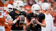 April 20, 2024; Austin, Texas, USA: Texas Longhorns quarterbacks Arch Manning (16), left, and  Quinn Ewers (3) throw passes while warming up ahead of the Longhorns' spring Orange and White game at Darrell K Royal Texas Memorial Stadium.