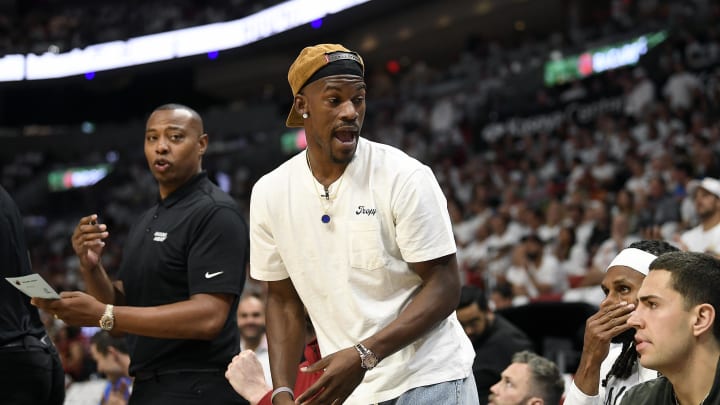 Apr 29, 2024; Miami, Florida, USA; Miami Heat forward Jimmy Butler (22) comments on the game from the bench during the first quarter of game four of the first round for the 2024 NBA playoffs, against the Boston Celtics, at Kaseya Center. Mandatory Credit: Michael Laughlin-USA TODAY Sports