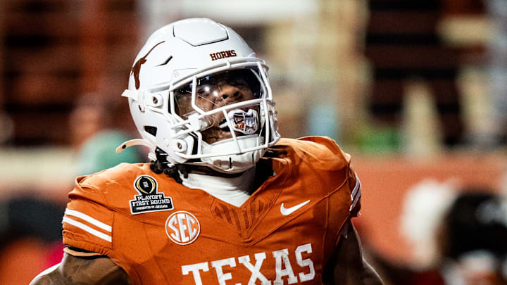 Texas Longhorns running back Jaydon Blue (23) smiles in the end zone after running the ball in for a touchdown in the fourth quarter as the Texas Longhorns play the Clemson Tigers in the first round of the College Football Playoffs at Darrell K Royal Texas Memorial Stadium in Austin, Texas, Dec. 21, 2024. Texas Longhorns running back Jaydon Blue (23) smiles in the end zone after running the ball in for a touchdown in the fourth quarter as the Texas Longhorns play the Clemson Tigers in the first round of the College Football Playoffs at Darrell K Royal Texas Memorial Stadium in Austin, Texas, Dec. 21, 2024.