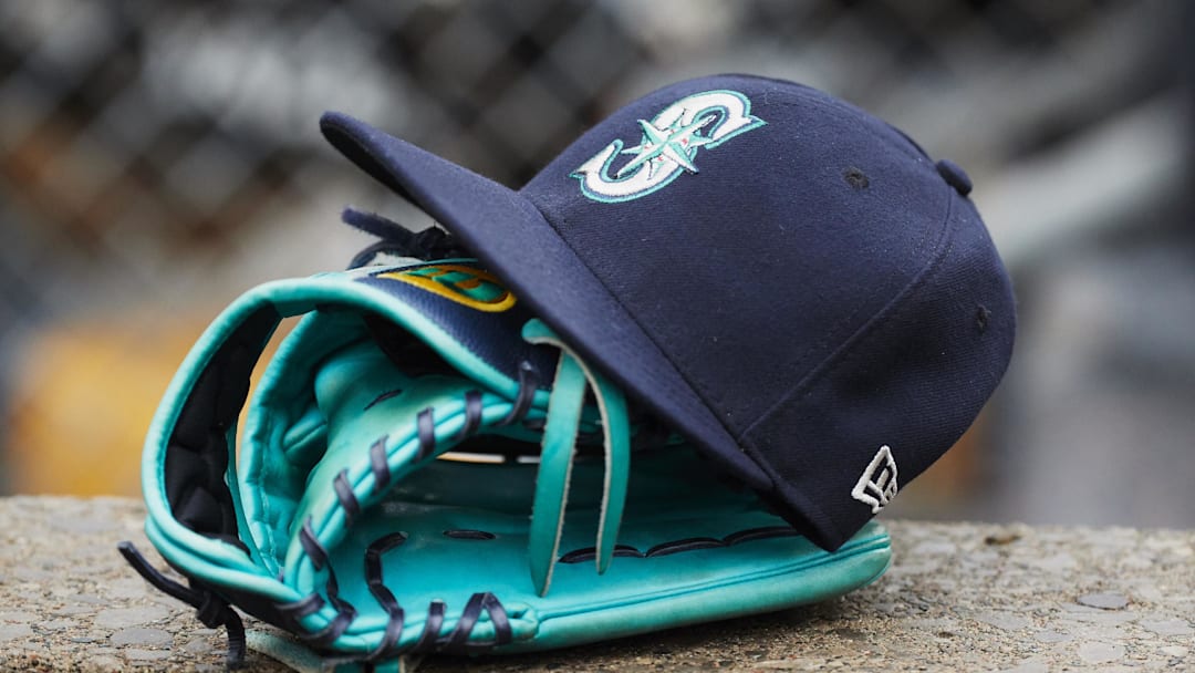 May 12, 2018; Detroit, MI, USA; Hat and glove of Seattle Mariners center fielder Dee Gordon (9) sits in dugout during the third inning against the Detroit Tigers at Comerica Park. Mandatory Credit: Rick Osentoski-Imagn Images