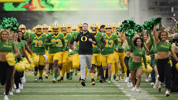 Eugene, Oregon, USA; Oregon Ducks head coach Dan Lanning leads his team before the start of a game against the Maryland Terra