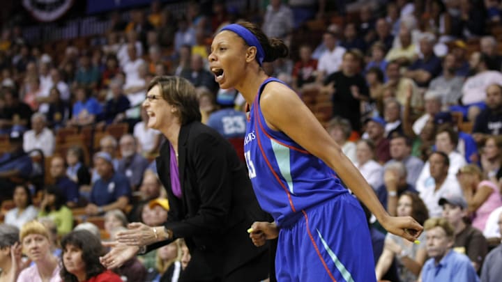 July 20, 2010; Uncasville, CT, USA; New York Liberty forward Plenette Pierson (33) and head coach Anne Donovan react from the bench as they take on the Connecticut Sun in overtime at the Mohegan Sun Arena. Liberty defeated the Sun in overtime 82-74. Mandatory Credit: David Butler II-Imagn Images