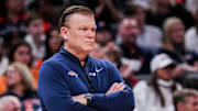 Illinois Fighting Illini head coach Brad Underwood watches the action Friday, March 14, 2025, in a quarterfinals game at the 2025 TIAA Big Ten Tournament between the Maryland Terrapins and the Illinois Fighting Illini at Gainbridge Fieldhouse in Indianapolis.