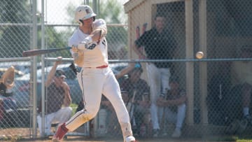 Central Bucks East's Chase Harlan (11) hits against Garnet Valley during their PIAA Class 6A District One playoff second-round game in Doylestown on Wednesday, May 22, 2024.