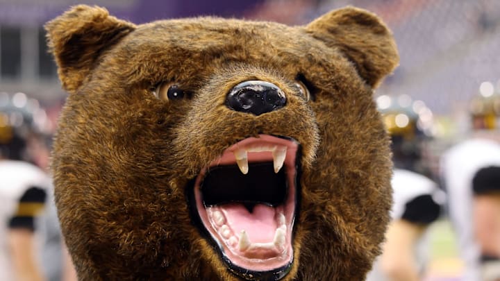 The Golden Bear leads a cheer as the Bishop Garrigan (Algona) Golden Bears compete against the Bedford Bulldogs for the Eight-Player championship on Thursday, November 16, 2023 at the UNI-Dome in Cedar Falls. The Golden Bear leads a cheer as the Bishop Garrigan (Algona) Golden Bears compete against the Bedford Bulldogs for the Eight-Player championship on Thursday, November 16, 2023 at the UNI-Dome in Cedar Falls.