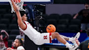 Rutgers Scarlet Knights guard Dylan Harper (2) dunks the ball Wednesday, March 12, 2025, in a first round game at the 2025 TIAA Big Ten Men’s Basketball Tournament between the USC Trojans and the Rutgers Scarlet Knights at Gainbridge Fieldhouse in Indianapolis. The USC Trojans defeated the Rutgers Scarlet Knights, 97-89.