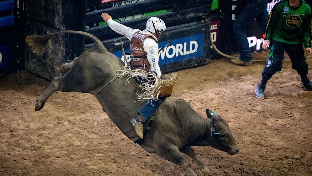 Missouri Wildcatters' Austin Richardson rides bull Snuggles against the New York Mavericks on the second day PBR Gambler Days at the Moody Center in Austin. Saturday, Aug. 24, 2024. Gambler Days is part of Professional Bull Riding's World Team Series, where teams of riders compete against other teams by adding their scores together, if they manage to stay on the bull for more than eight seconds.