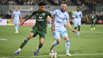 Feb 24, 2024; Portland, Oregon, USA; Portland Timbers forward Antony (11) steals the ball away from Colorado Rapids defender Keegan Rosenberry (2) during the second half at Providence Park. Mandatory Credit: Troy Wayrynen-USA TODAY Sports