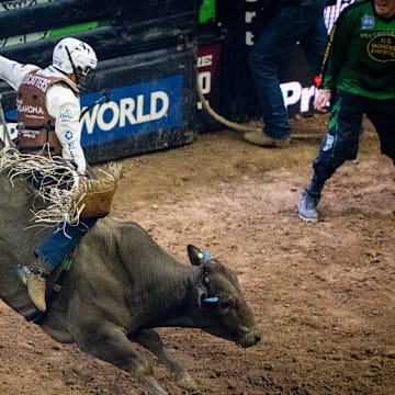 Missouri Wildcatters' Austin Richardson rides bull Snuggles against the New York Mavericks on the second day PBR Gambler Days at the Moody Center in Austin. Saturday, Aug. 24, 2024. Gambler Days is part of Professional Bull Riding's World Team Series, where teams of riders compete against other teams by adding their scores together, if they manage to stay on the bull for more than eight seconds.