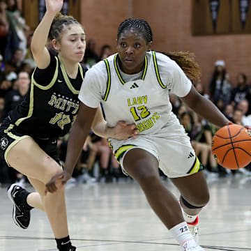 Ontario Christian freshman Tati Griffin drives hard to the basket en route to two of her 14 points, helping the Knights beat Archbishop Mitty 61-44 in the premier game of the 4th Sabrina Ionescu Classic in Concord 1/4/2025. Griffin injured her right knee in a summer event Sunday July 6 and the girls basketball community holds their breath waiting for MRI results to return early this week.