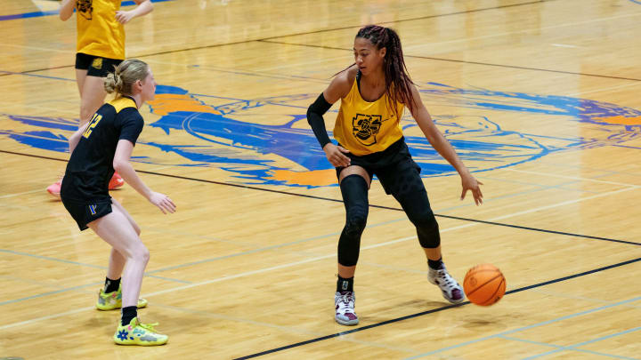 Salpointe Catholic High School's Taliyah Henderson (right) plays in the Monarch Sports Lady Extravaganza Tournament at Westwood High School on June 3, 2023, in Mesa.