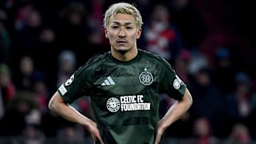Celtic forward Daizen Maeda stands on the pitch during UCL second leg knock-out playoff match against Bayern Munich. 