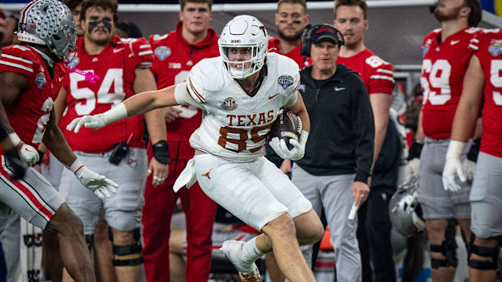 Texas Longhorns tight end Gunnar Helm (85) runs the ball down the sideline in the fourth quarter as the Texas Longhorns play the Ohio State Buckeyes in the Cotton Bowl College Football Playoff semi-final at AT&T Stadium in Dallas, Texas, Jan. 10, 2025. Texas Longhorns tight end Gunnar Helm (85) runs the ball down the sideline in the fourth quarter as the Texas Longhorns play the Ohio State Buckeyes in the Cotton Bowl College Football Playoff semi-final at AT&T Stadium in Dallas, Texas, Jan. 10, 2025.