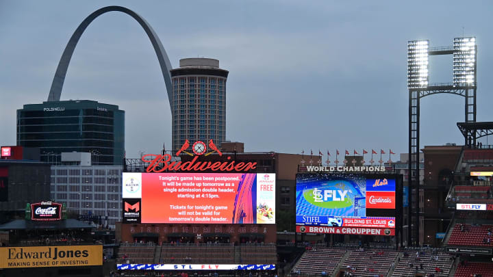 May 4, 2021; St. Louis, Missouri, USA;  A message on the scoreboard informs fans that the game between the St. Louis Cardinals and the New York Mets has been postponed and will be made up as part of a doubleheader on May 5,2021 at Busch Stadium. Mandatory Credit: Jeff Curry-USA TODAY Sports