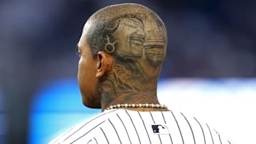 Para algunos jugadores de los Yankees de Nueva York es imposible disimular sus tatuajes