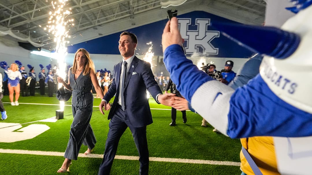 New Kentucky Wildcat head coach Will Stein arrives with wife, Darby has he is introduced at Kentucky on Wednesday, December 3, 2025