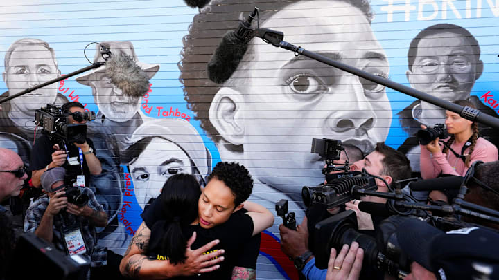 Phoenix Mercury star Brittney Griner hugs Neda Sharghi, the sister of Emad Sharghi, who is being held in Iran, after unveiling a mural outside of Footprint Center on Apr 27, 2023, that brings awareness to individuals still detained abroad. Briner held her first press conference since returning to the United States after she was arrested at a Russian airport where officials  said they found cannabis oil in her luggage and was imprisoned in a Russian penal colony. Following a 10-month