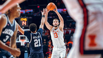 Illinois center Tomislav Ivisic (13) looks for a cutter in the Illini's 113-55 win over Jackson State in the team's season opener last month at State Farm Center in Champaign, Illinois.