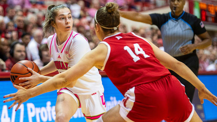 Indiana's Shay Ciezki (10) looks to pass around Nebraska's Callin Hake (14) during the Indiana versus Nebraska women's basketball game at Simon Skjodt Assembly Hall on Sunday, Feb. 2, 2025.