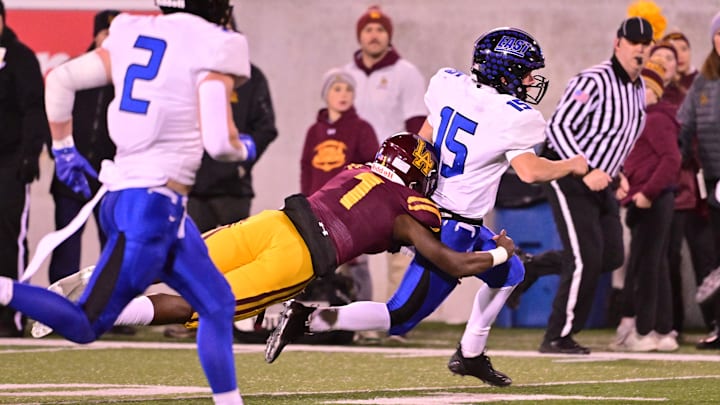 Loyola Academy safety Donovan Robinson makes a tackle in the 2023 Illinois high school football Class 8A championship game.