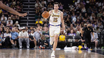 Oct 6, 2024; Palm Desert, California, USA; Los Angeles Lakers guard Austin Reaves (15) moves the ball against the Phoenix Suns during the second half at Acrisure Arena. Mandatory Credit: David Frerker-Imagn Images