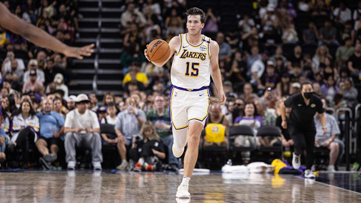 Oct 6, 2024; Palm Desert, California, USA; Los Angeles Lakers guard Austin Reaves (15) moves the ball against the Phoenix Suns during the second half at Acrisure Arena. Mandatory Credit: David Frerker-Imagn Images