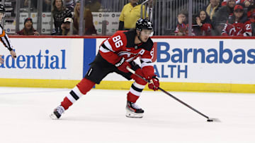 Dec 6, 2024; Newark, New Jersey, USA; New Jersey Devils center Jack Hughes (86) skates with the puck against the Seattle Kraken during the second period at Prudential Center. Mandatory Credit: Ed Mulholland-Imagn Images