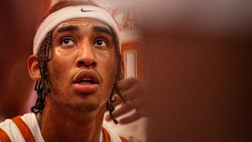 Texas Longhorns forward Devon Pryor (22) listens to coaching during a timeout in the second half of the Longhorns' game against the Chicago State Cougars at the Moody Center in Austin, Nov. 12, 2024.